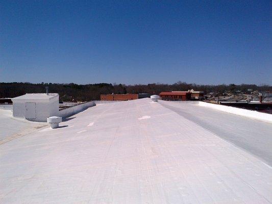 Silicone Roof Coating applied to an aged EPDM roof. It created a seamless roof system eliminating the threat of leaks.