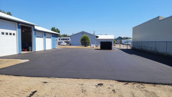 New pavement for our parking lot in August 2023.