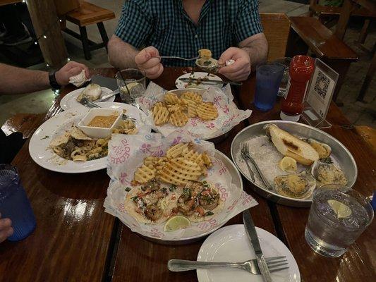 Seafood platter, steak tacos, shrimp tacos, and bbq oysters