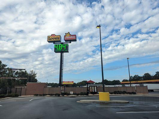 Love's and Hardee's sign that you can see from I-85 / I-40 near exit 152. Hardee's drive-thru lane.