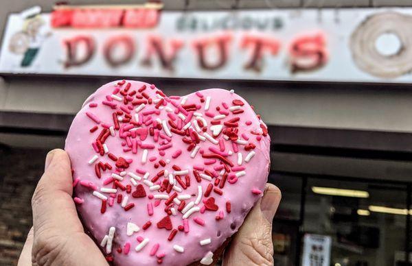 Valentine's pink iced with sprinkles heart donut!