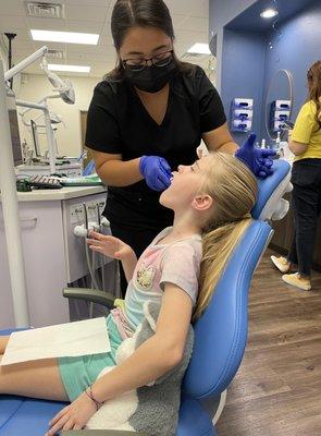 Making a mold of her teeth for the retainer.