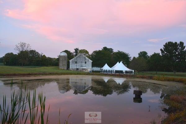 Sunset at Crown Rose Estate with tent and Bank Barn.