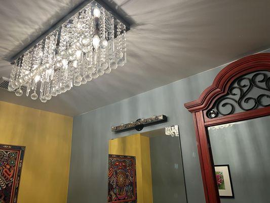 Chandelier in ladies room