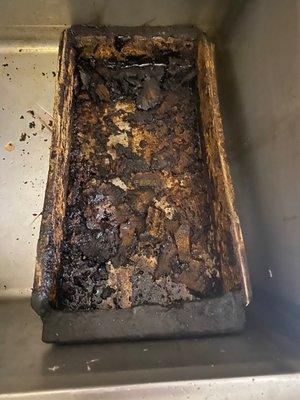 Pic of the grease trap, it hadn't been cleaned in months when I started there and was told not to touch it!