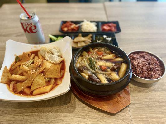 Tteokbokki, Galbi Jjim, Purple Rice (Front - L to R) Banchan (Back)