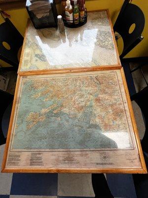 Cool tables with intricate maps of the sound