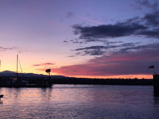 Behind the main breakwater.