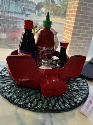 Pig sauce holder at the table