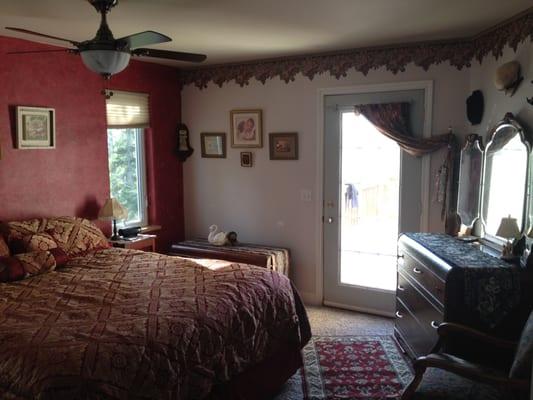 EAGLES NEST - Antique victorian style master suite has private bath with huge claw-foot tub, shower, walk-in closet, door to the deck.