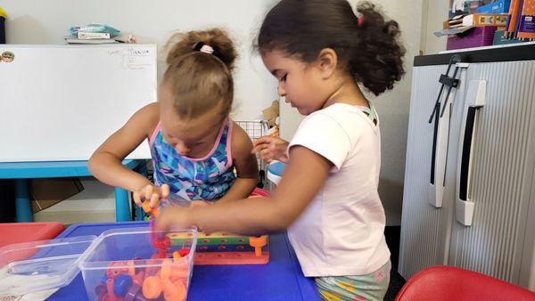 Sharing fine motor skills and sharing