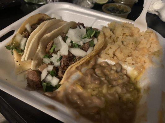 Don't mind my bite outta the taco. Bitten taco= carnitas other taco = lengua