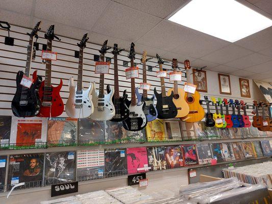 Guitars, bases, and ukuleles for sale