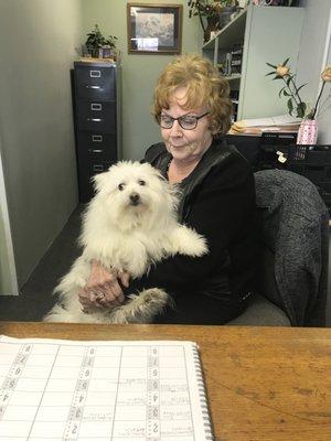 Sometimes, if you're lucky, Betty will bring her pup, Snickers, in to help at the front desk!