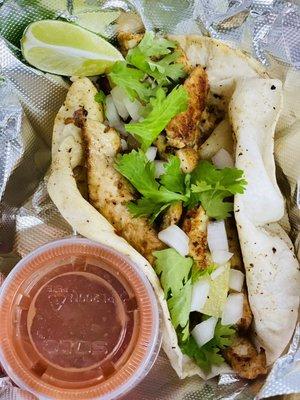 BE SOMEONE - Chicken Al-Pastor taco, garnished with grilled pineapple, onions, cilantro, lime wedge & habanero salsa!