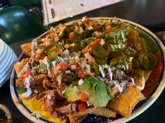 Fiesta Nacho Quesadilla

Fried Quesadillas, loaded with your choice of meat, beans, pico, avo, sour cream & jalapeños