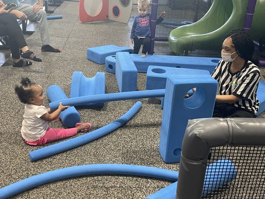 Employee Playing with Child