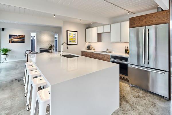 Full kitchen remodel for this Eichler in Willow Glen. We designed, built, and installed the kitchen and bathroom vanity for this customer.