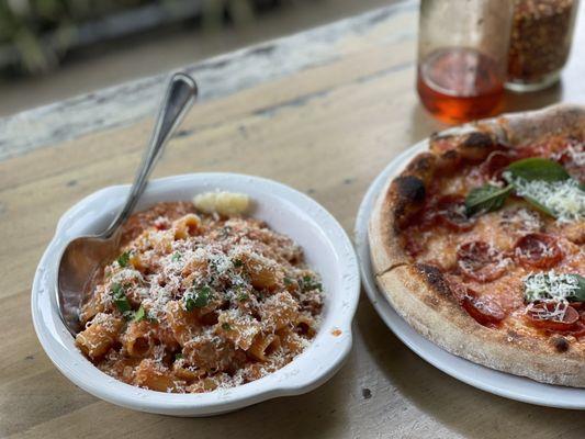 Happy hour rigatoni ($12) and pepperoni pizza ($8)