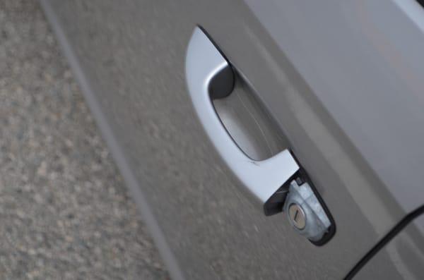 Parts of door handle missing.