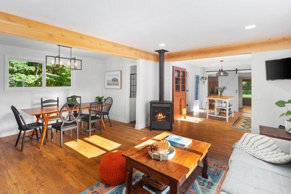 Here is a photo of the living room remodel. We added some faux beams over their drywall beams and it turned out really nice.