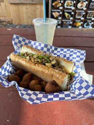 Portland Cheesesteak with fried mushrooms and a lemonade