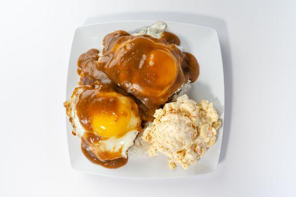 Loco Moco Plate  Enjoy a juicy hamburger patty topped with a fried egg and smothered in savory gravy, served with macaroni salad and rice