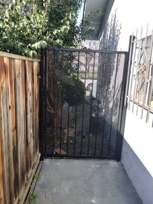 The side yard pedestrian gate