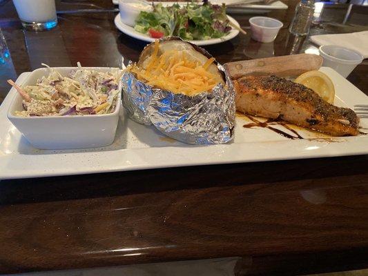 Salmon, loaded baked potato and fantastic Cole slaw.