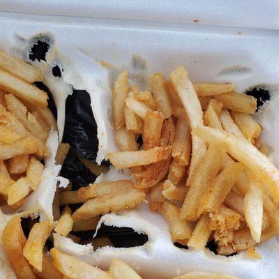 Close up where fries melted carton. Most fell through into bag below but a good portion had clumps of melted Styrofoam stuck to them. Yum!