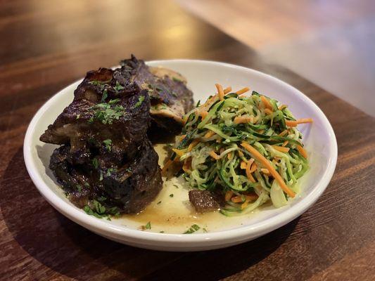 Beef short ribs - yes!!! With zucchini carrot "noodles". Both were so delicious. The beef easily fell of the bone - so tender!