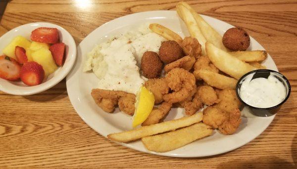 Cracker Barrel in Bowling Green, Kentucky. Fried Shrimp with Hush Puppies, Mashed Potatoes, Steak Fries, and Fresh Fruit.