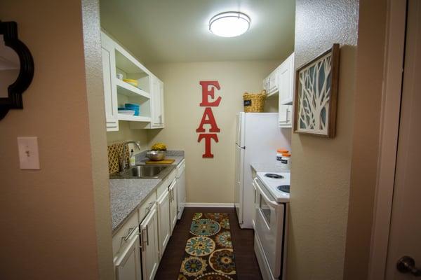 Kitchen with granite counters and updated appliances