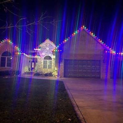 Residential holiday lights hanging