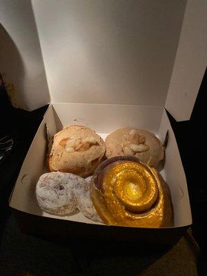 Cinnamon roll, powdered donut and apple cinnamon donuts