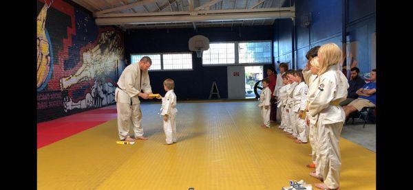 Promotion to Yellow Belt. Congratulations!