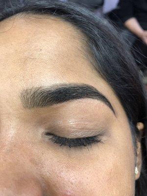 Eyebrows threading and tinting after