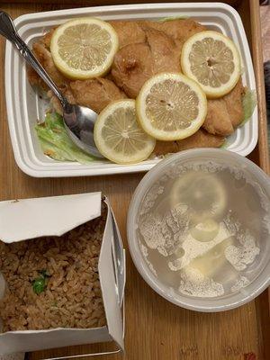 Fried Lemon Chicken, Egg Fried Rice with onion and green pea, lemon sauce on the side.