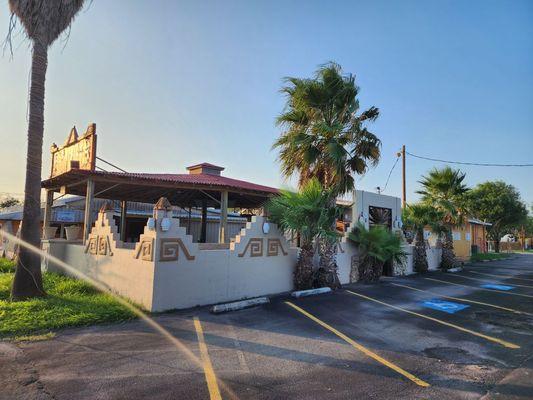 Exterior view of Fiesta Mayan's entrance at sunset