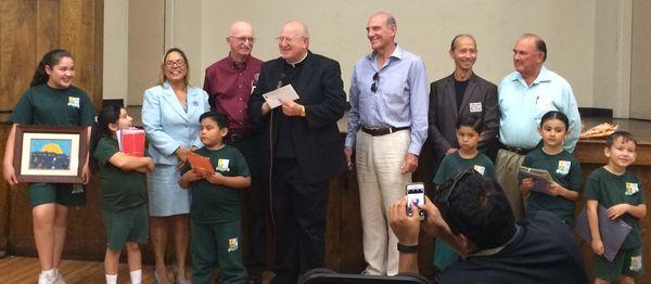 Our leaders, Monsignor John and Angelica Figueroa (Principal) host our friends, The Knights of Columbus.