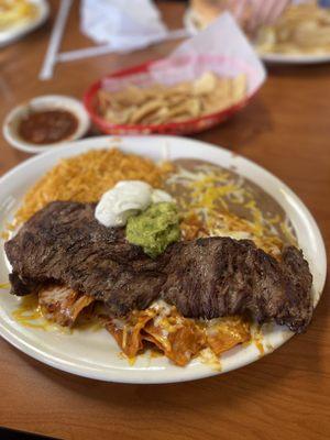 Red chilaquiles with steak