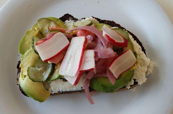 Avocado toast with lots of fresh ingredients