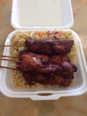 Chicken sticks with fried pork rice. All tasty and fresh