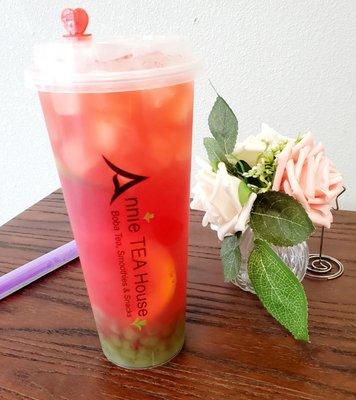 Strawberry passion fruit tea with matcha boba