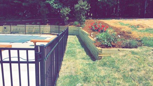 Retaining wall project and mulching.