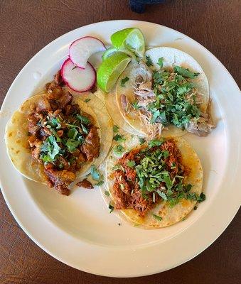 Al Pastor, Carnitas, and Deshebrada tacos