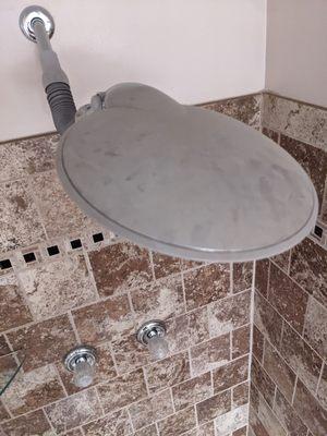 Dust on shower head