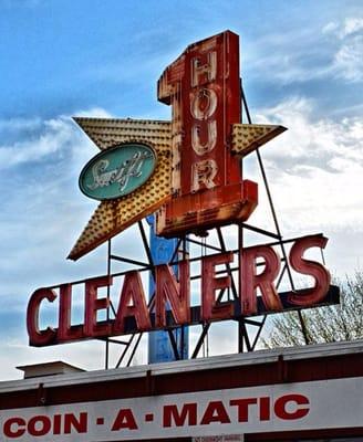 Awesome sign on top of Swift Cleaners