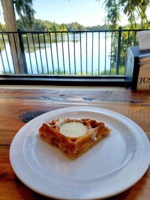 Apple cinnamon scone shaped like a waffle. Warm and delicious with cream cheese frosting. Yum!