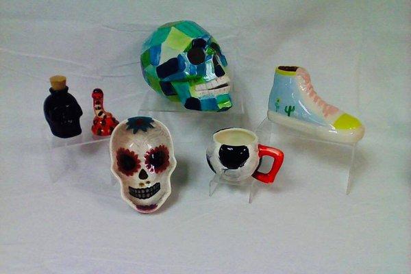 Skull (back middle) and soccer ball mug (lower right)